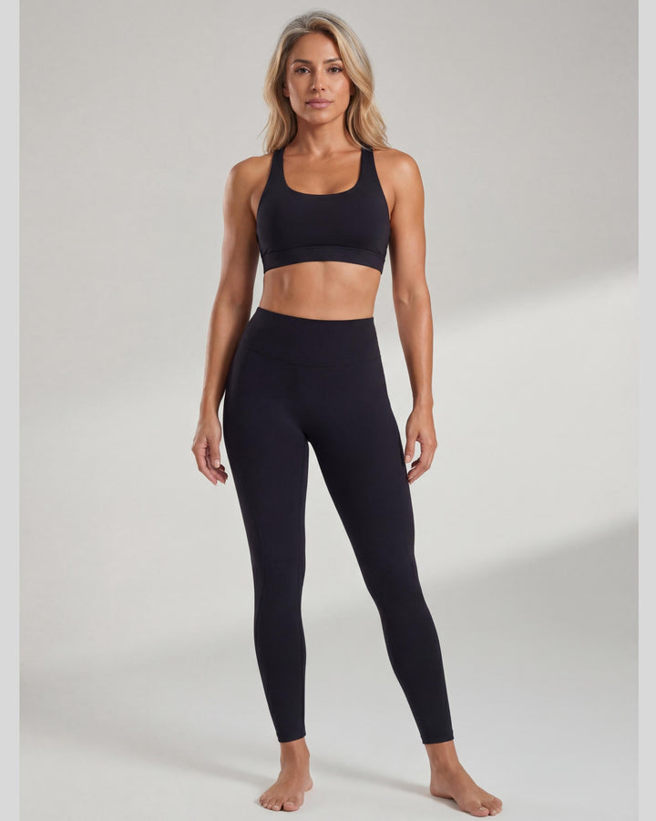 VLIZ AuraFlow Full-Length Leggings in black, laid flat on a white background. Features a V-shaped high-rise waistband with the VLIZ logo, designed for a sleek, supportive fit ideal for gym workouts, yoga, Pilates, and everyday training.