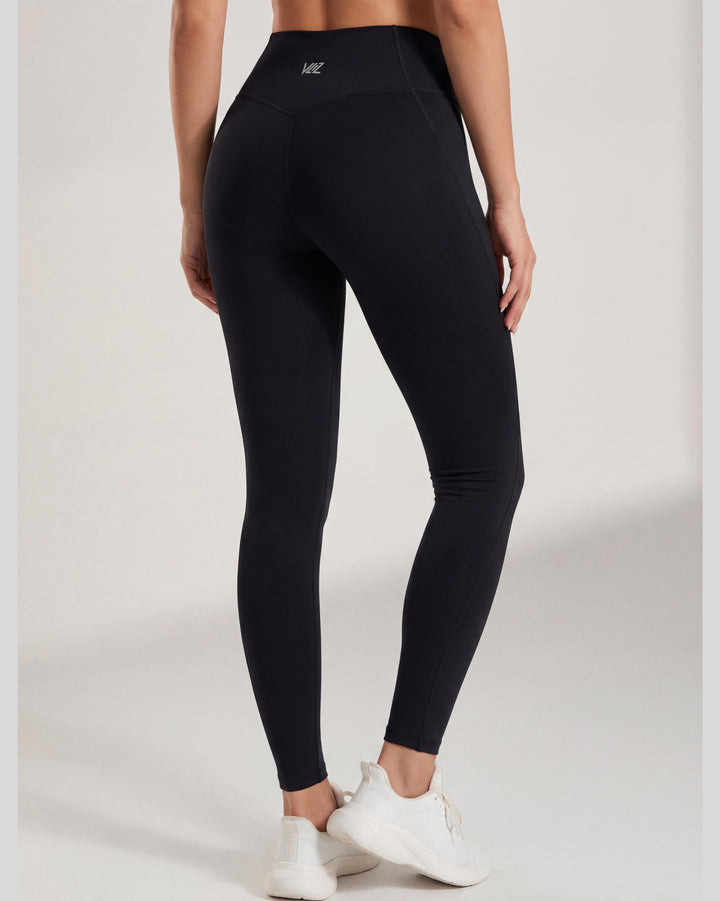 VLIZ AuraFlow Full-Length Leggings in black, laid flat on a white background. Features a V-shaped high-rise waistband with the VLIZ logo, designed for a sleek, supportive fit ideal for gym workouts, yoga, Pilates, and everyday training.
