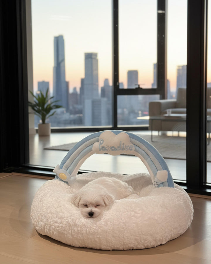 VLIZ Pets Rainbow Cloud Bed in Pink Or BabyBlue, handmade with imitation rabbit velvet fabric, featuring a cloud-shaped supportive base and detachable rainbow arch, Disney-certified quality.