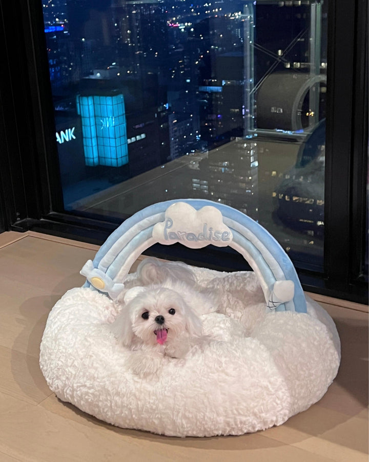 VLIZ Pets Rainbow Cloud Bed in Pink Or BabyBlue, handmade with imitation rabbit velvet fabric, featuring a cloud-shaped supportive base and detachable rainbow arch, Disney-certified quality.