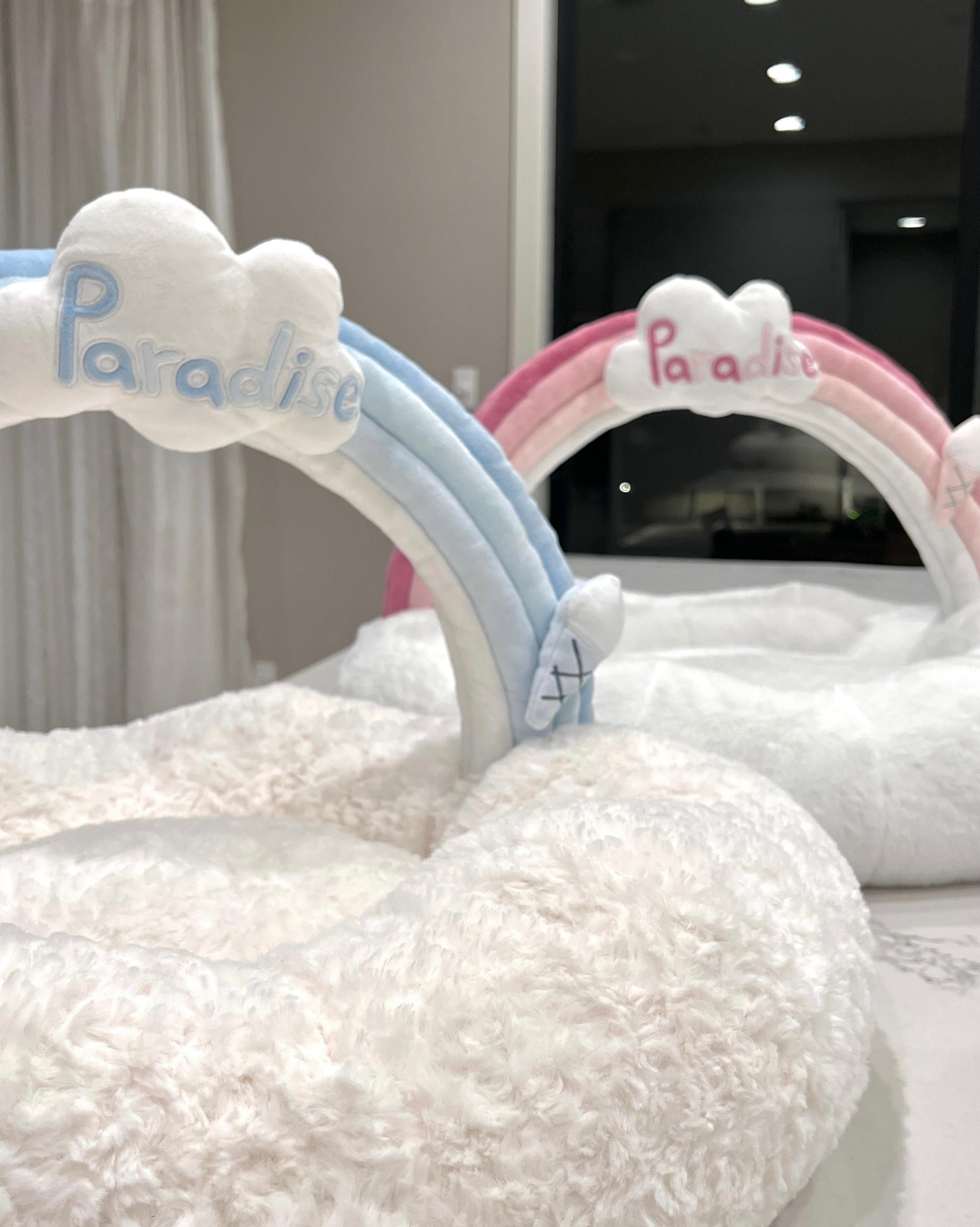 VLIZ Pets Rainbow Cloud Bed in Pink Or BabyBlue, handmade with imitation rabbit velvet fabric, featuring a cloud-shaped supportive base and detachable rainbow arch, Disney-certified quality.