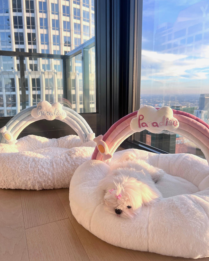 VLIZ Pets Rainbow Cloud Bed in Pink Or BabyBlue, handmade with imitation rabbit velvet fabric, featuring a cloud-shaped supportive base and detachable rainbow arch, Disney-certified quality.