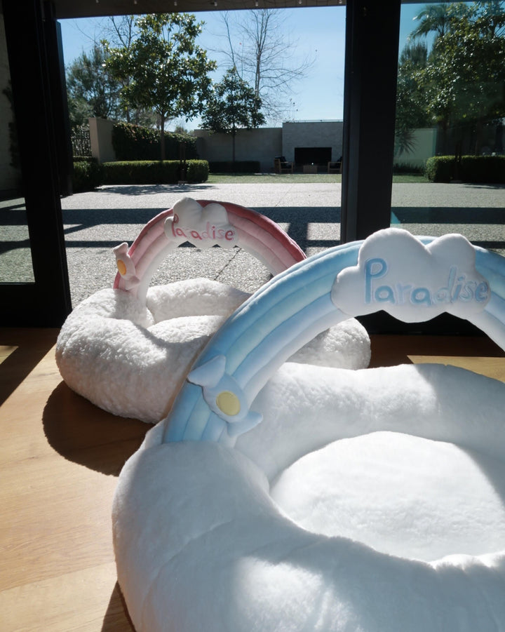VLIZ Pets Rainbow Cloud Bed in Pink Or BabyBlue, handmade with imitation rabbit velvet fabric, featuring a cloud-shaped supportive base and detachable rainbow arch, Disney-certified quality.