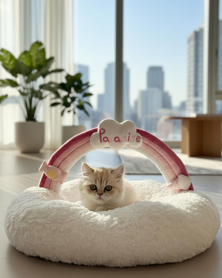 VLIZ Pets Rainbow Cloud Bed in Pink Or BabyBlue, handmade with imitation rabbit velvet fabric, featuring a cloud-shaped supportive base and detachable rainbow arch, Disney-certified quality.