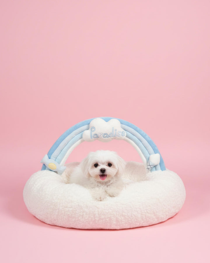 VLIZ Pets Rainbow Cloud Bed in Pink Or BabyBlue, handmade with imitation rabbit velvet fabric, featuring a cloud-shaped supportive base and detachable rainbow arch, Disney-certified quality.