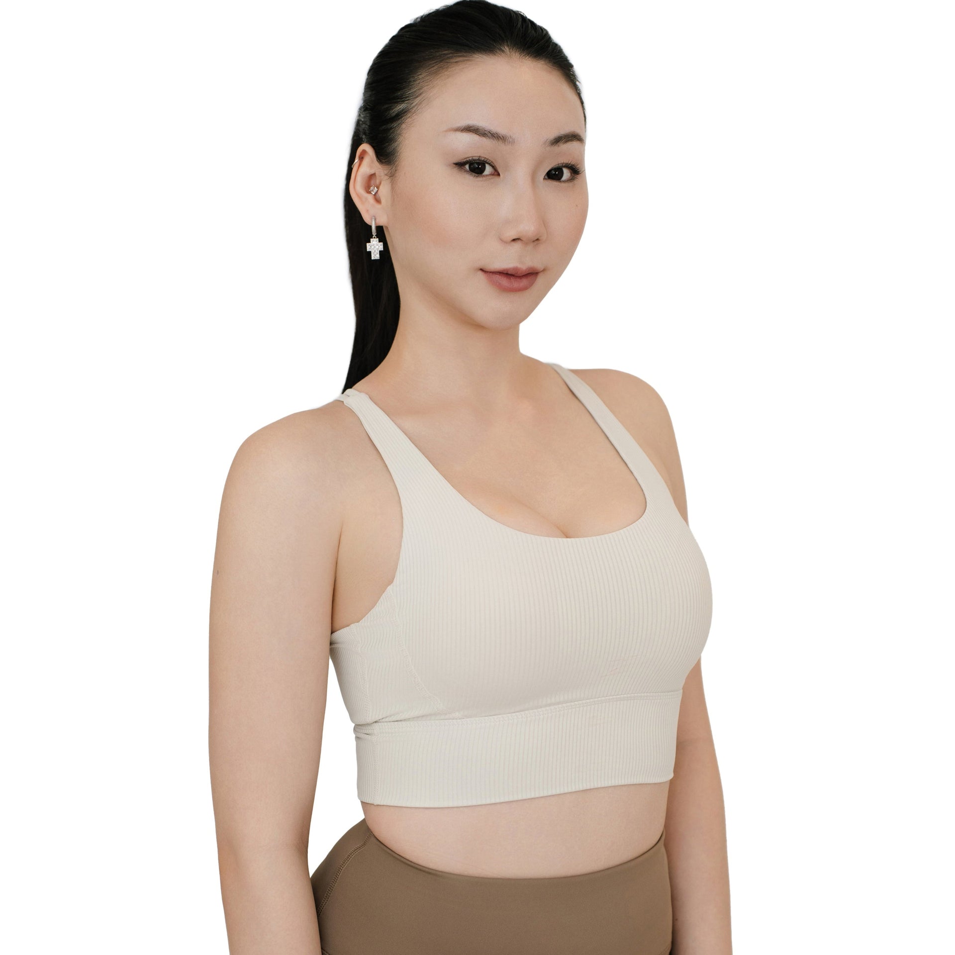 VLIZ ContourFlex Cross-Back Sports Bra in white shown from the front, featuring ribbed fabric, scoop neckline, and wide underband for support, ideally for yoga and training.