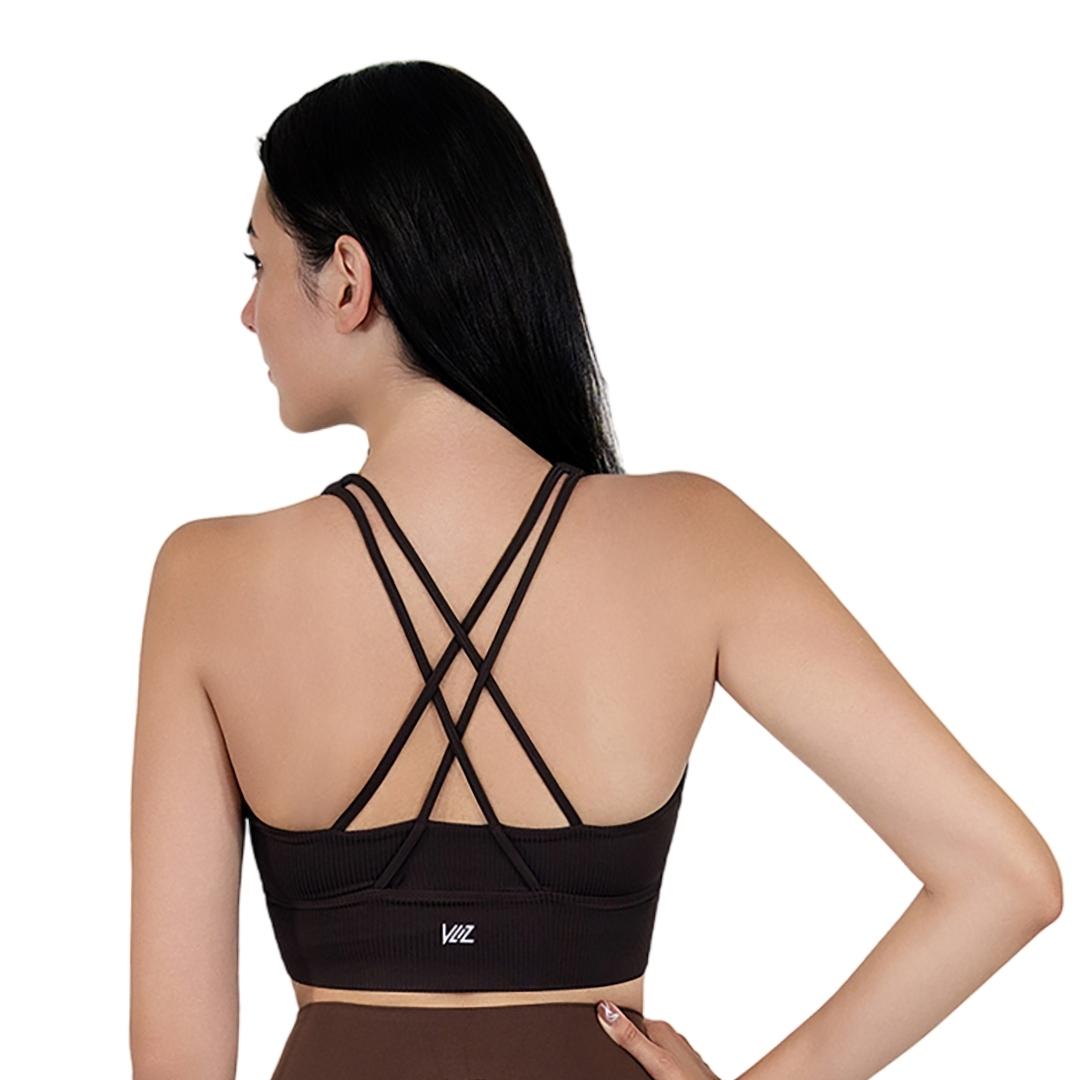 Model in VLIZ ContourFlex Cross-Back Sports Bra in Espresso, featuring criss-cross back straps and a sculpting, supportive fit ideal for yoga, Pilates, cardio, tennis, and everyday active movement.