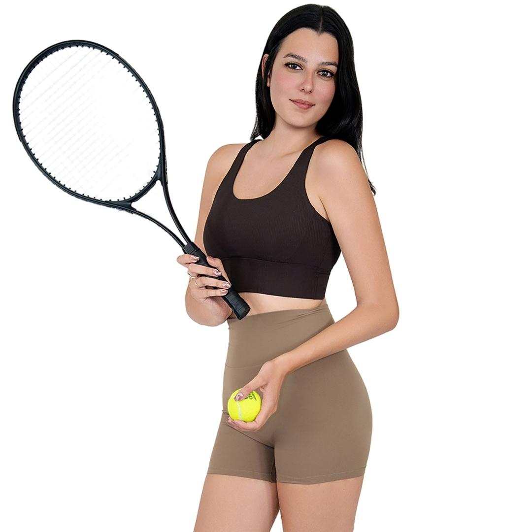Model in VLIZ ContourFlex Cross-Back Sports Bra in Espresso, featuring criss-cross back straps and a sculpting, supportive fit ideal for yoga, Pilates, cardio, tennis, and everyday active movement.