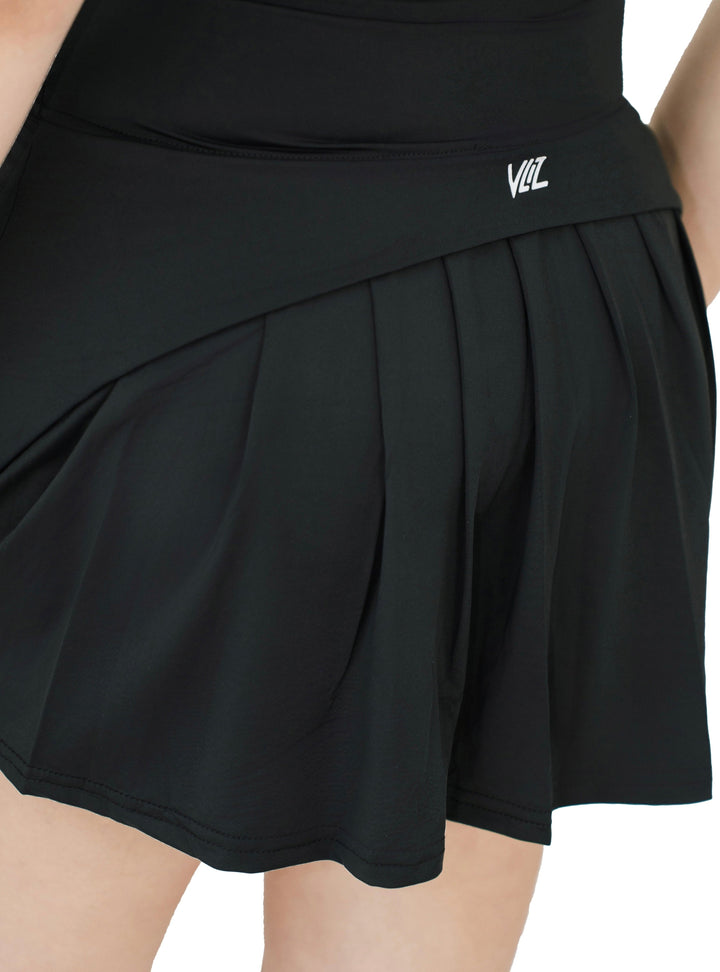 Back view of VLIZ ContourFlex Tennis Skirt in black, showcasing pleated skirt design and VLIZ logo on waistband.