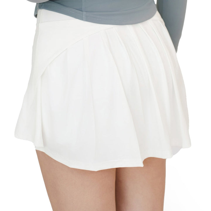 VLIZ ContourFlex High-Waist Tennis Skirt in white shown from the back, featuring a flared hem and pleated detailing.