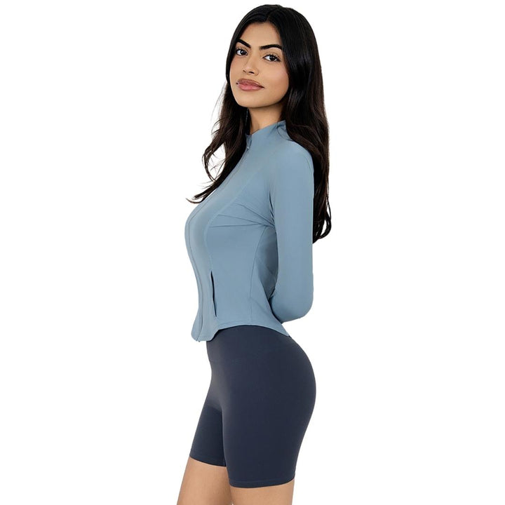 Model wearing the VLIZ Full-Zip Slim Fit Long Sleeve Top in Ash Gray, featuring an ice-touch fabric, mock neck, thumbhole cuffs, and a sleek silhouette ideal for tennis, hiking, outdoor training, and active layering.