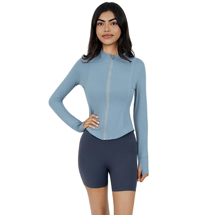 Model wearing the VLIZ Full-Zip Slim Fit Long Sleeve Top in Ash Gray, featuring an ice-touch fabric, mock neck, thumbhole cuffs, and a sleek silhouette ideal for tennis, hiking, outdoor training, and active layering.