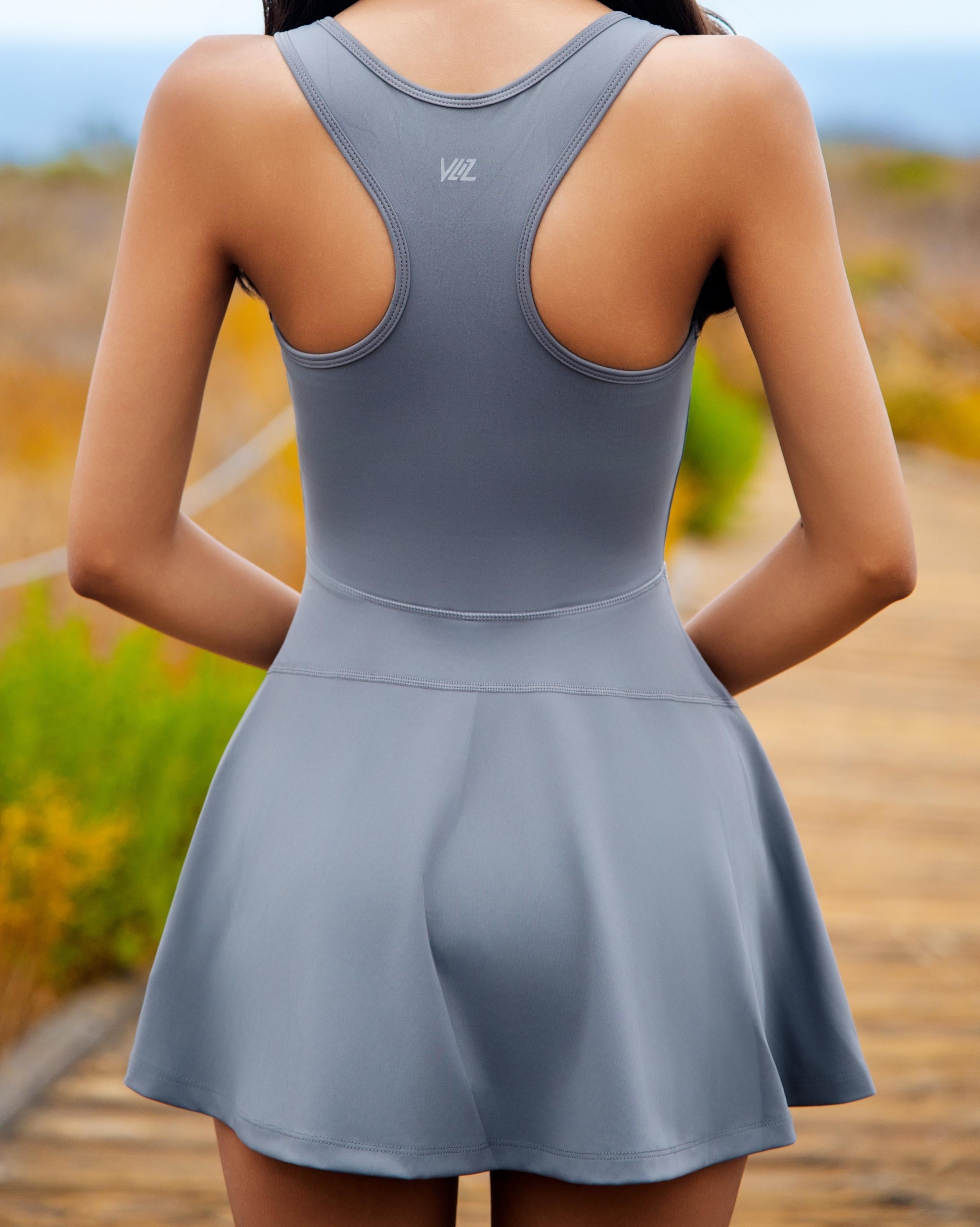 VLIZ Half-Zip Tennis Skort – Gray; half-zip front; contoured seams; designed for active performance; suitable for tennis, Pilates, and outdoor workouts.