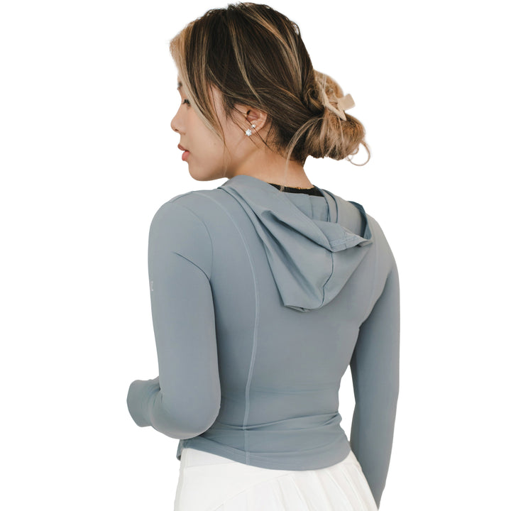 Rear angled view of the VLIZ Rapid UV Full Zip SlimFit Hooded Top in Ash Gray, highlighting the hood and back contour fit.