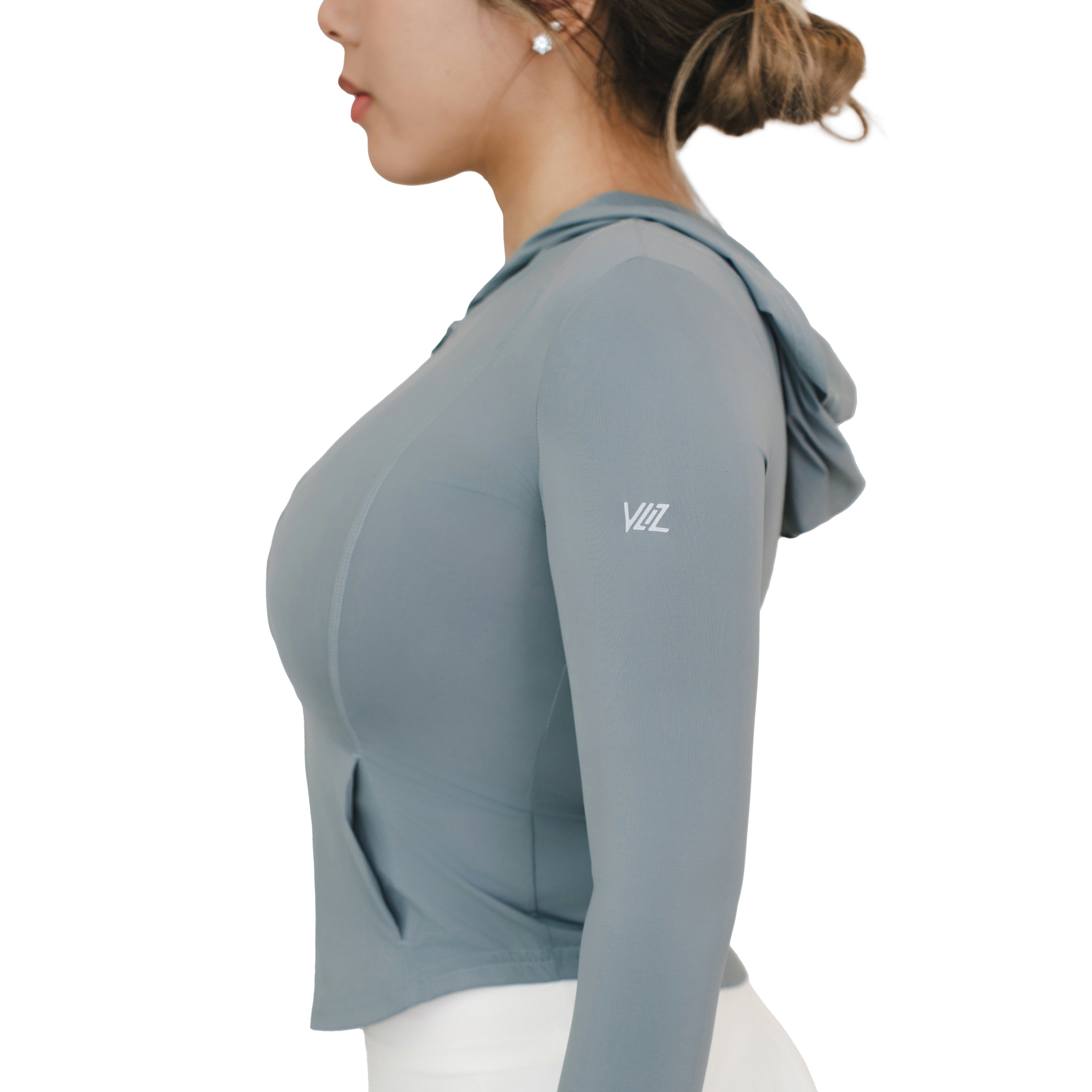  Side view of model wearing VLIZ Rapid UV Full Zip SlimFit Hooded Top in Ash Gray, highlighting logo and hood design.