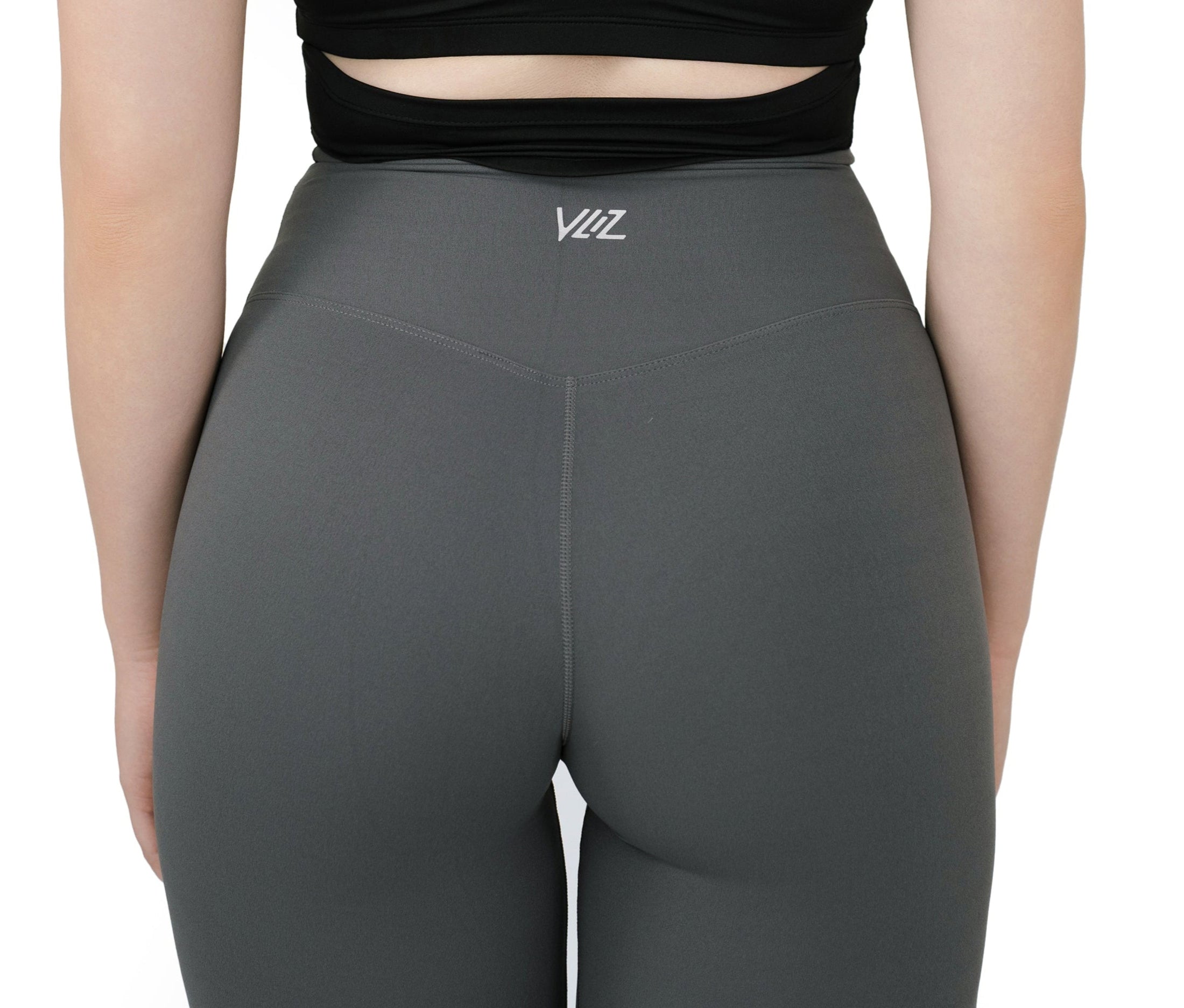 Back view of VLIZ Ultra Soft SculptFit Long Leggings in gray with high-rise fit and subtle seam detailing