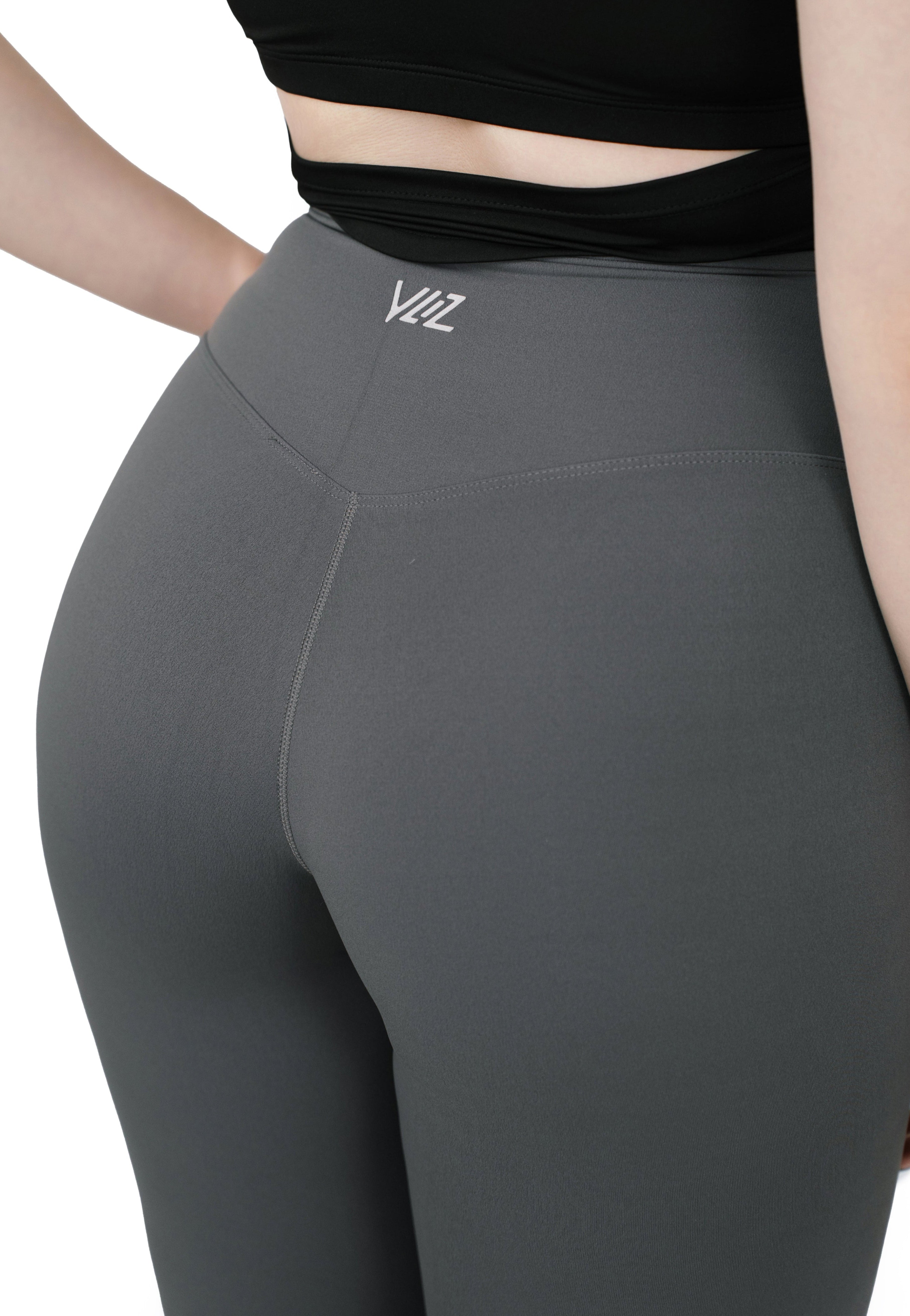Close-up back view of VLIZ Ultra Soft SculptFit Long Leggings in gray showing seamless waistband and fabric texture