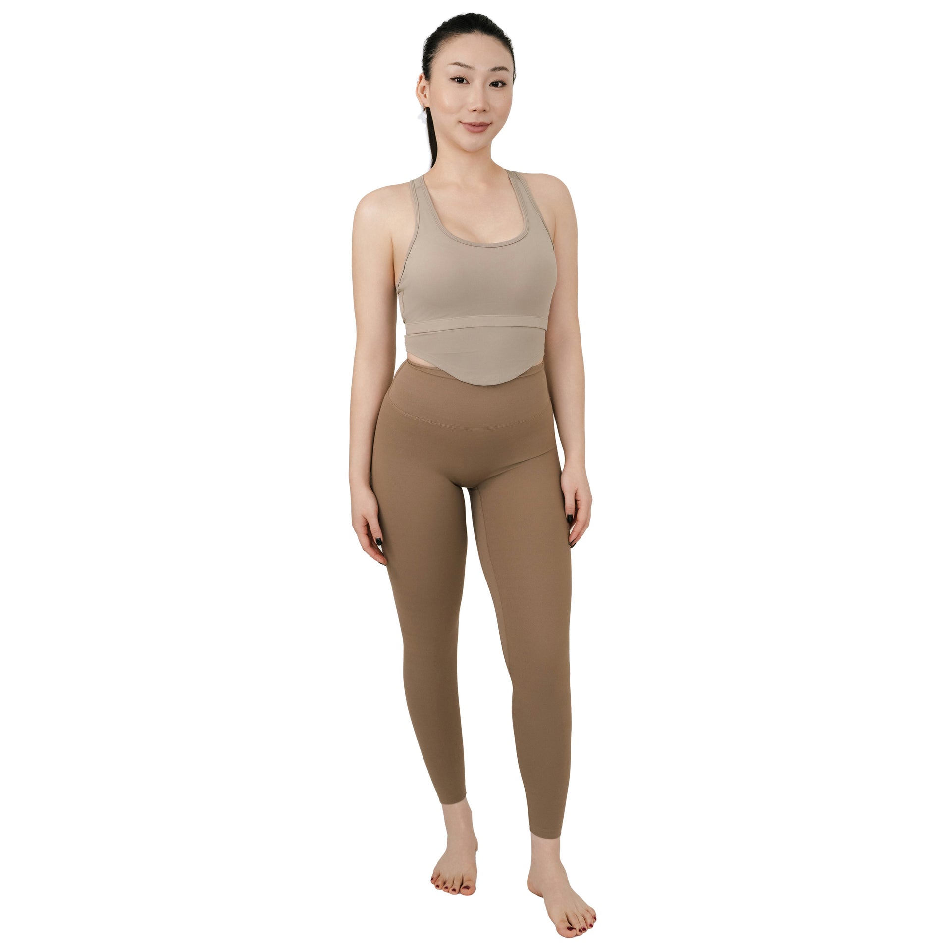 VLIZ Ultra Soft SculptFit Long Leggings in khaki shown from the front, paired with a beige sports bra, highlighting the high-rise waist and full length fit.