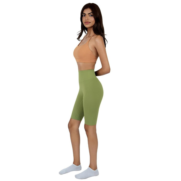 VLIZ Ultra Soft SculptFit Mid-Length Legging Shorts in Matcha Green, featuring a sleek high-waisted design, compressive contour fit, and a hidden phone pocket at the inner back waistband—ideal for yoga, Pilates, cardio, and gym workouts.