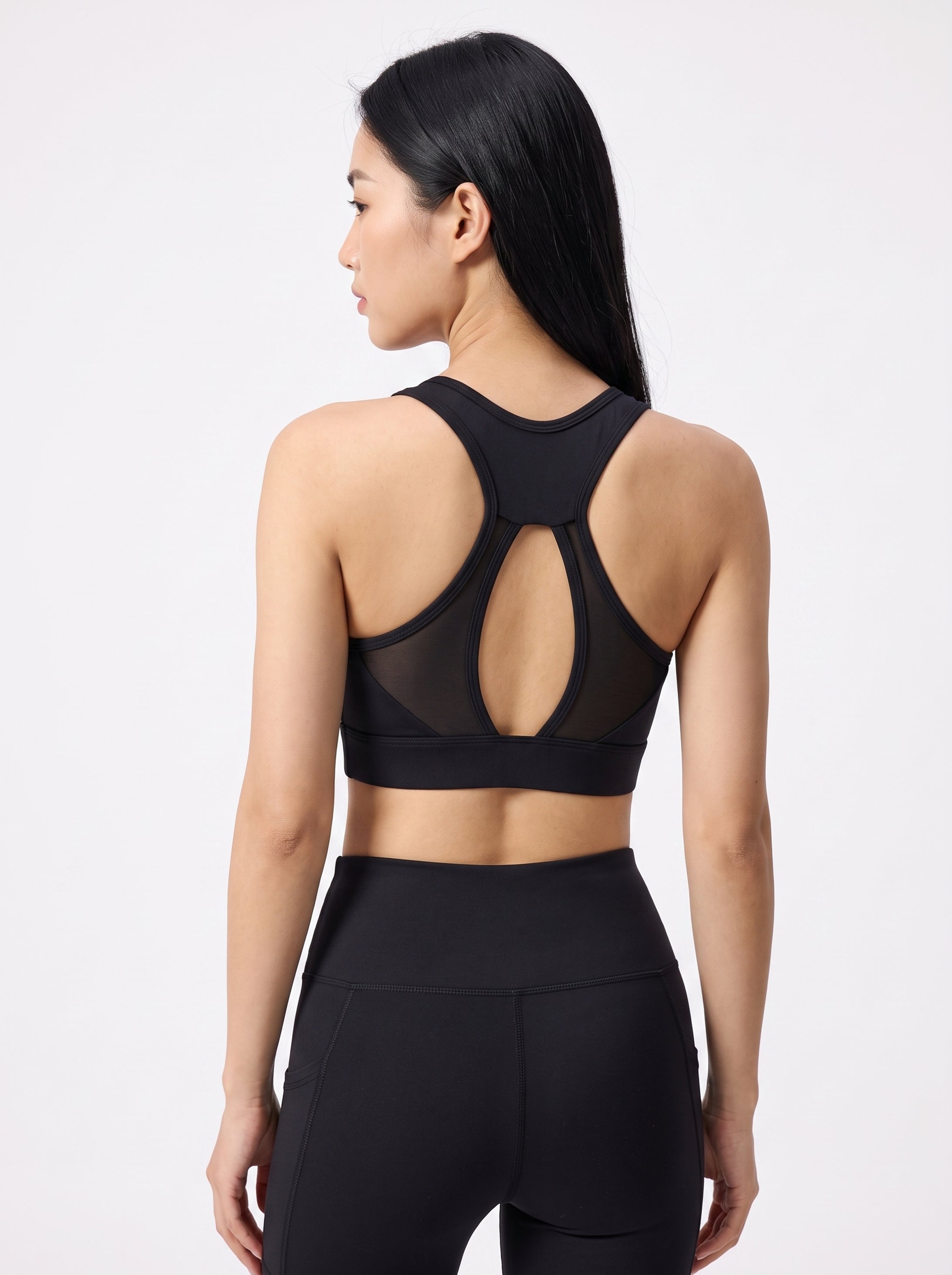 VLIZ women's black mesh-back sports bra with keyhole detail, back view