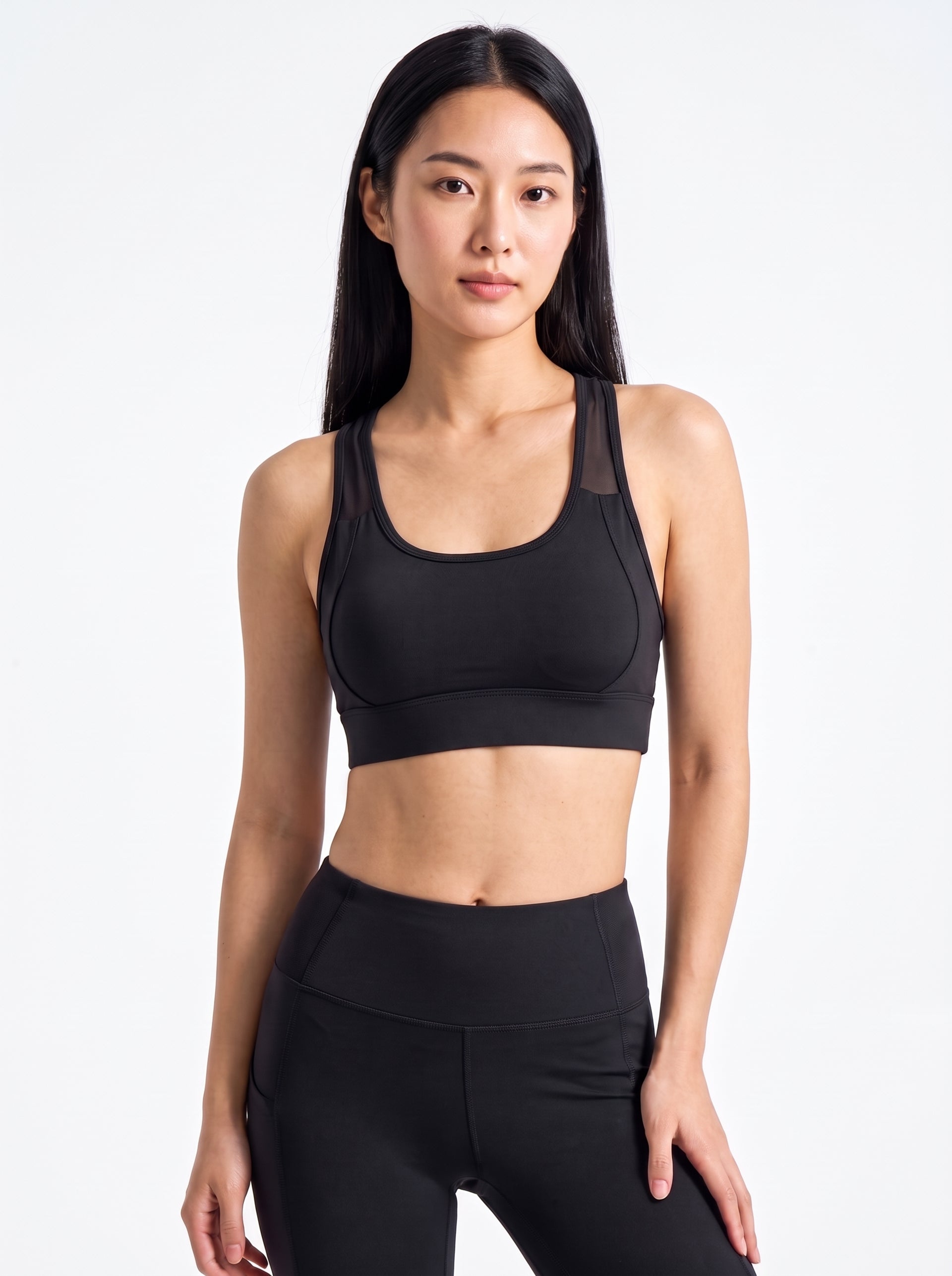 VLIZ women's black scoop-neck sports bra for gym and studio training, front view
