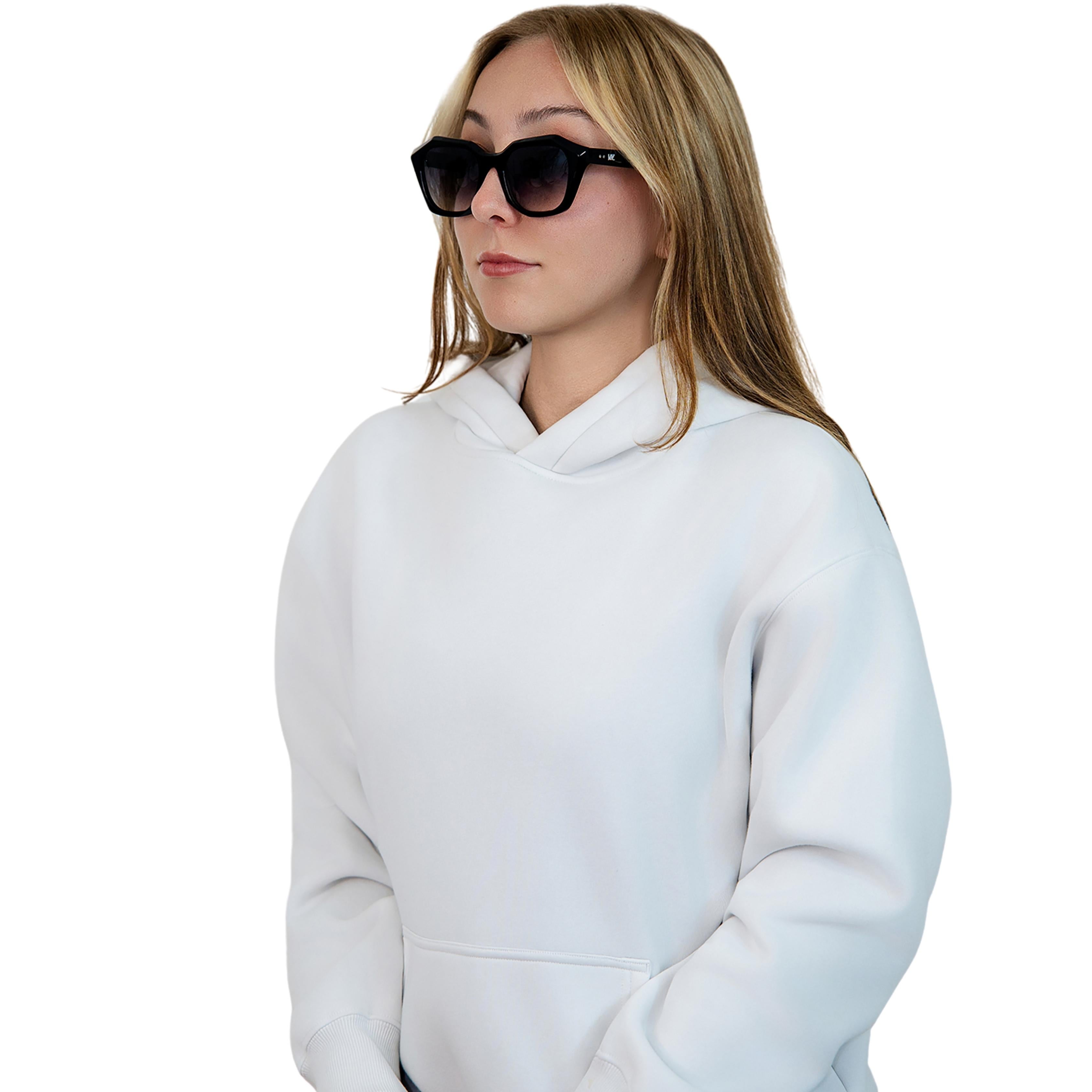 Model wearing VLIZ Altara sunglasses with a black square-oval frame and grey lenses, styled with a hoodie and layered necklace, emphasizing the unisex streetwear-inspired design and UV400 lens protection.