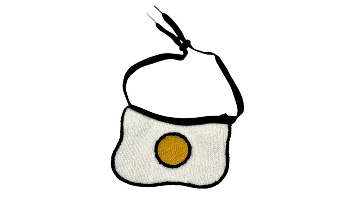 White pet bandana with an embroidered fried egg design, made of soft and breathable fabric, featuring an adjustable tie-up style for a cute and comfortable fit.