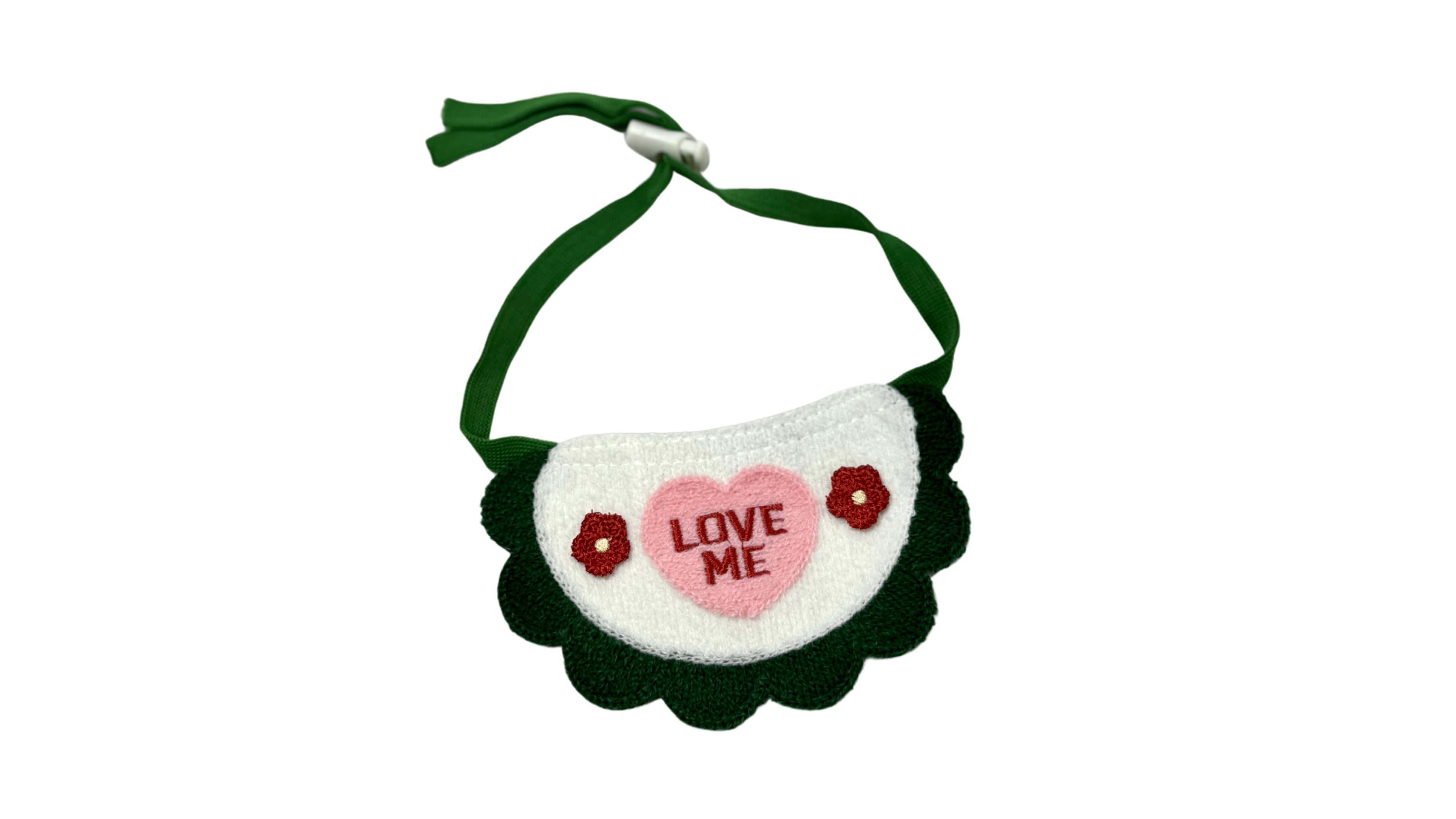 Green knitted pet bandana with a 3D texture, featuring an adjustable tie-up design and embroidered "LOVE me" text for a cute and cozy look.