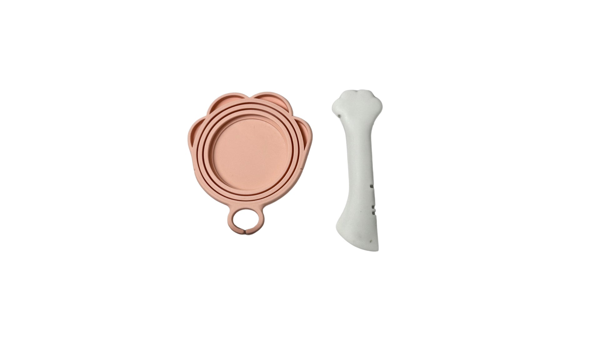 Pink and white pet food can spoon and lid set, made from silicone and resin, designed for scooping, stirring, and sealing wet pet food cans.