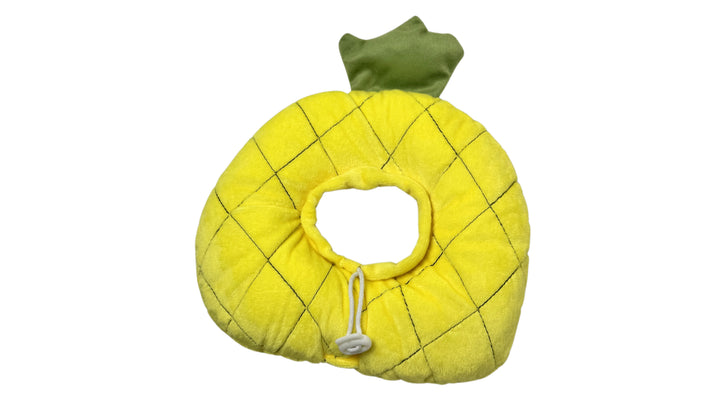 Soft plush pineapple-shaped pet recovery collar with cushioned padding, adjustable drawstring closure, and an 8.5cm inner circle diameter for post-surgery protection.