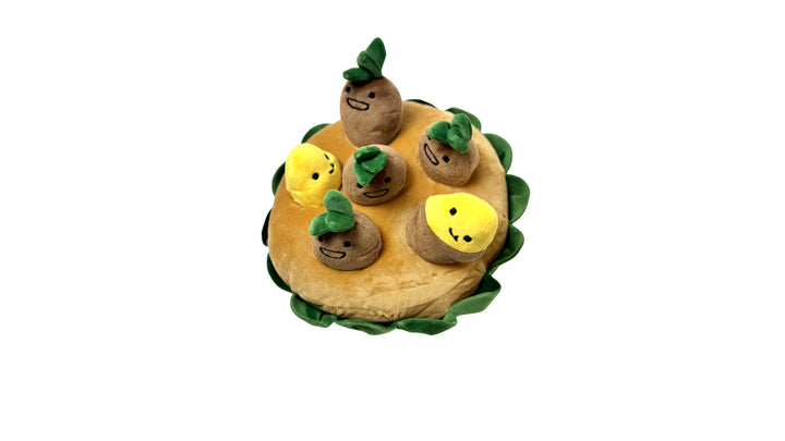 Plush sweet potato dog toy with a removable design, built-in squeaker, and hidden treat feature for interactive and mentally stimulating play.