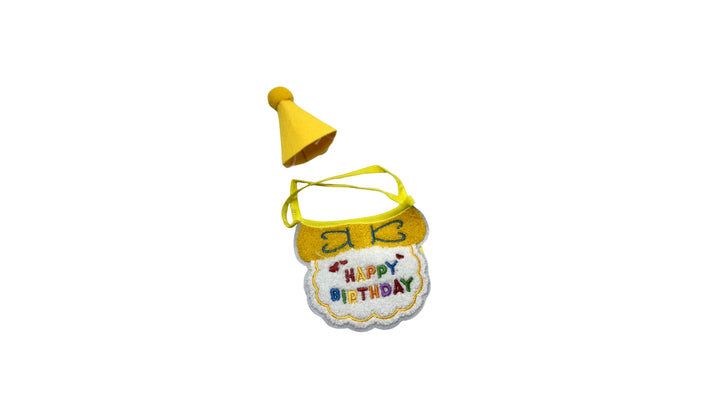 Yellow pet birthday set including a small party hat and embroidered bib with "HAPPY BIRTHDAY" text, featuring adjustable straps for a comfortable fit.