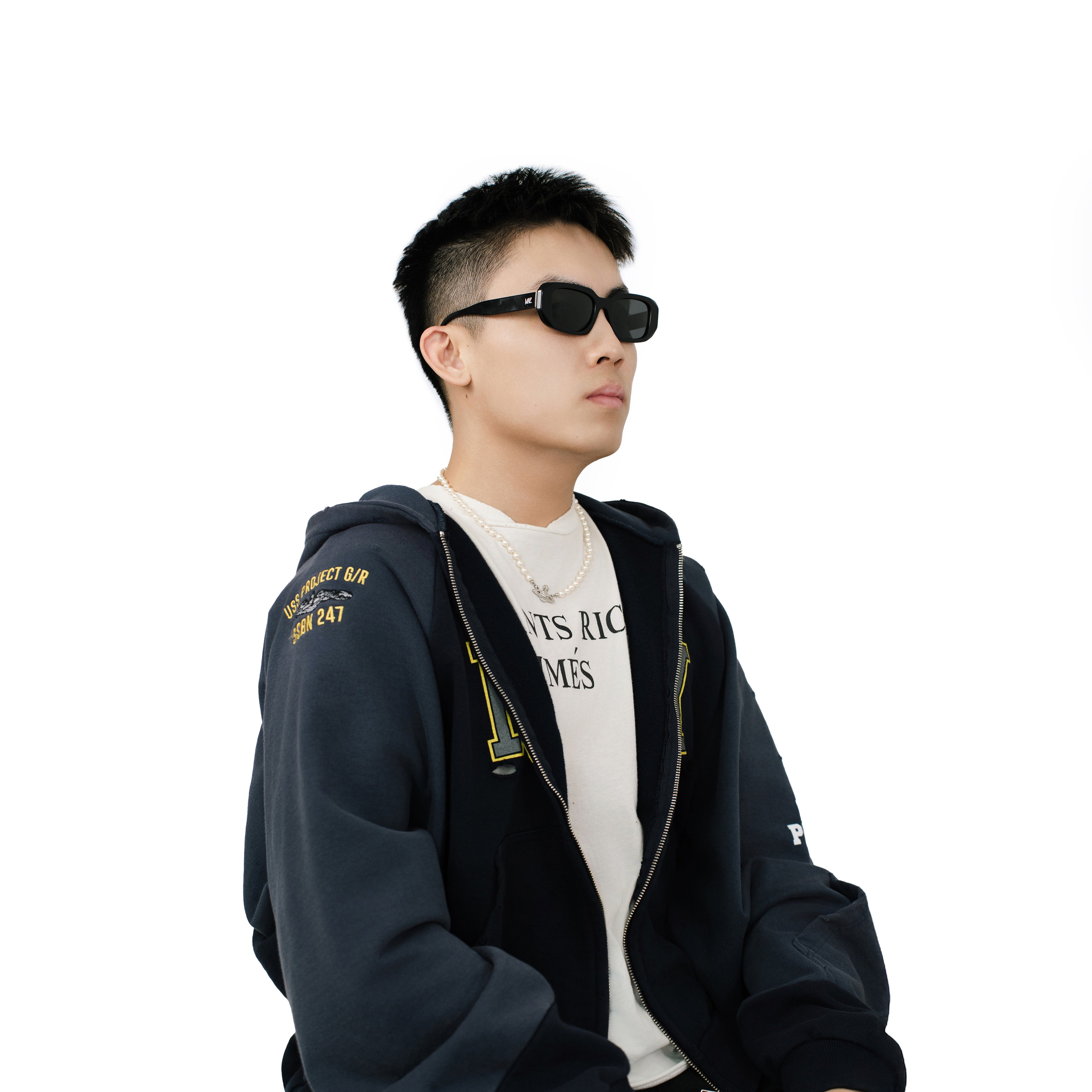 VLIZ Crux sunglasses with black frame and black lenses, square-edge design, engraved logo on temples.