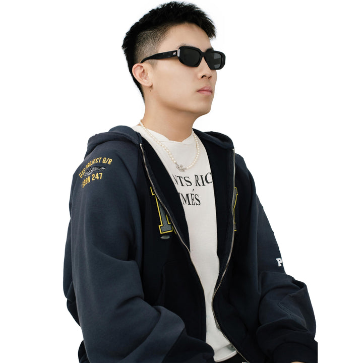 VLIZ Crux sunglasses with black frame and black lenses, square-edge design, engraved logo on temples.