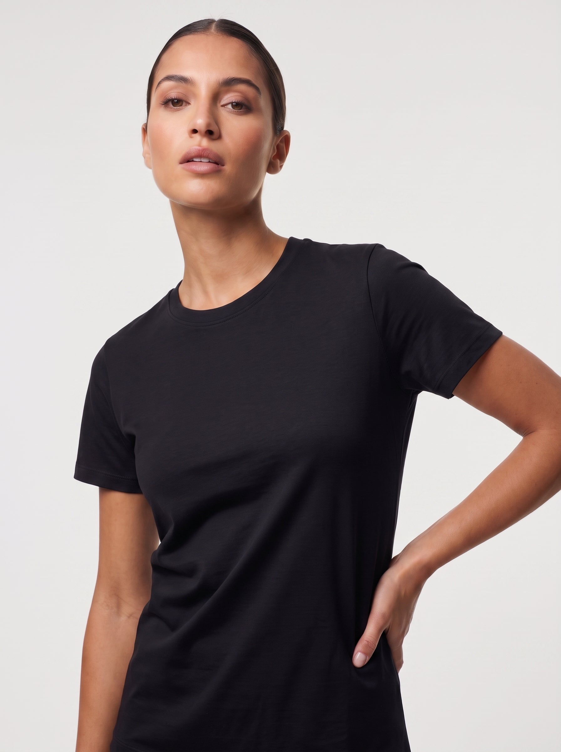 VLIZ Fitted Sports T-Shirt in Black, close up front view, high-neck sculpt fit designed to flatter every shape