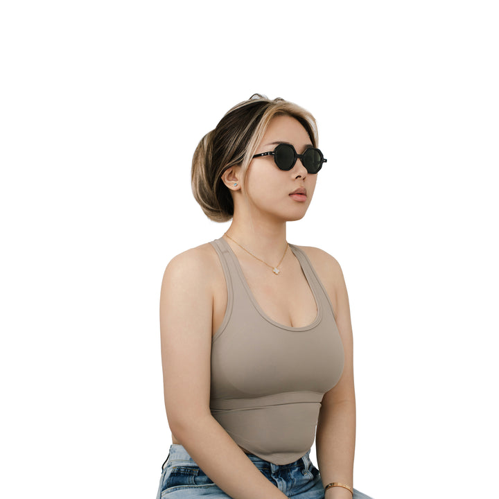 VLIZ Grid sunglasses with black octagon frame and dark green lenses, architectural design with engraved logo on temples.