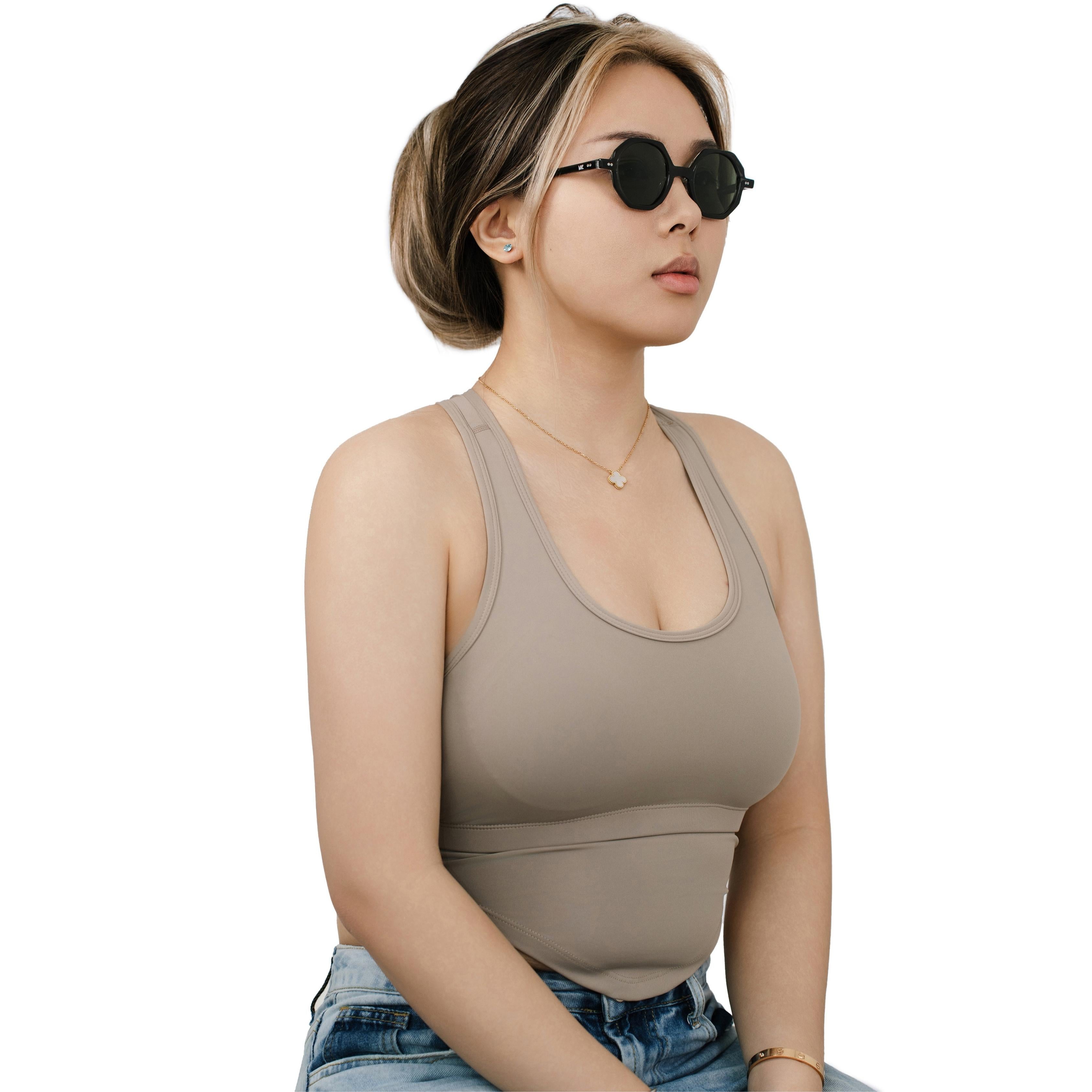 VLIZ Grid sunglasses with black octagon frame and dark green lenses, architectural design with engraved logo on temples.
