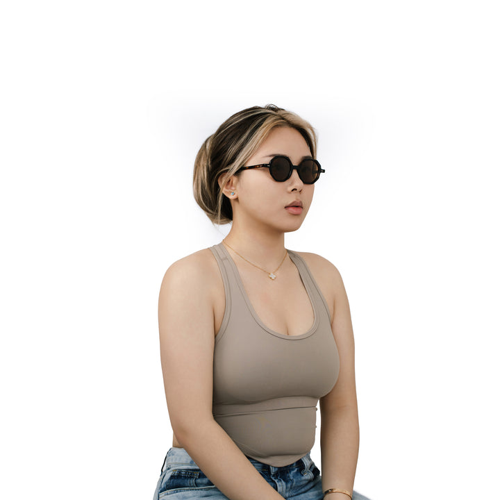VLIZ Grid sunglasses with tortoise octagon frame and brown lenses, sculptural streetwear design with engraved logo on temples