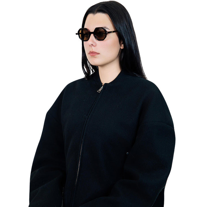 VLIZ Grid sunglasses with tortoise octagon frame and brown lenses, sculptural streetwear design with engraved logo on temples.