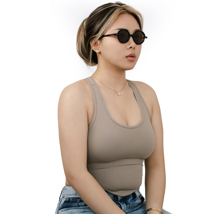 VLIZ Grid sunglasses with tortoise octagon frame and brown lenses, sculptural streetwear design with engraved logo on temples.