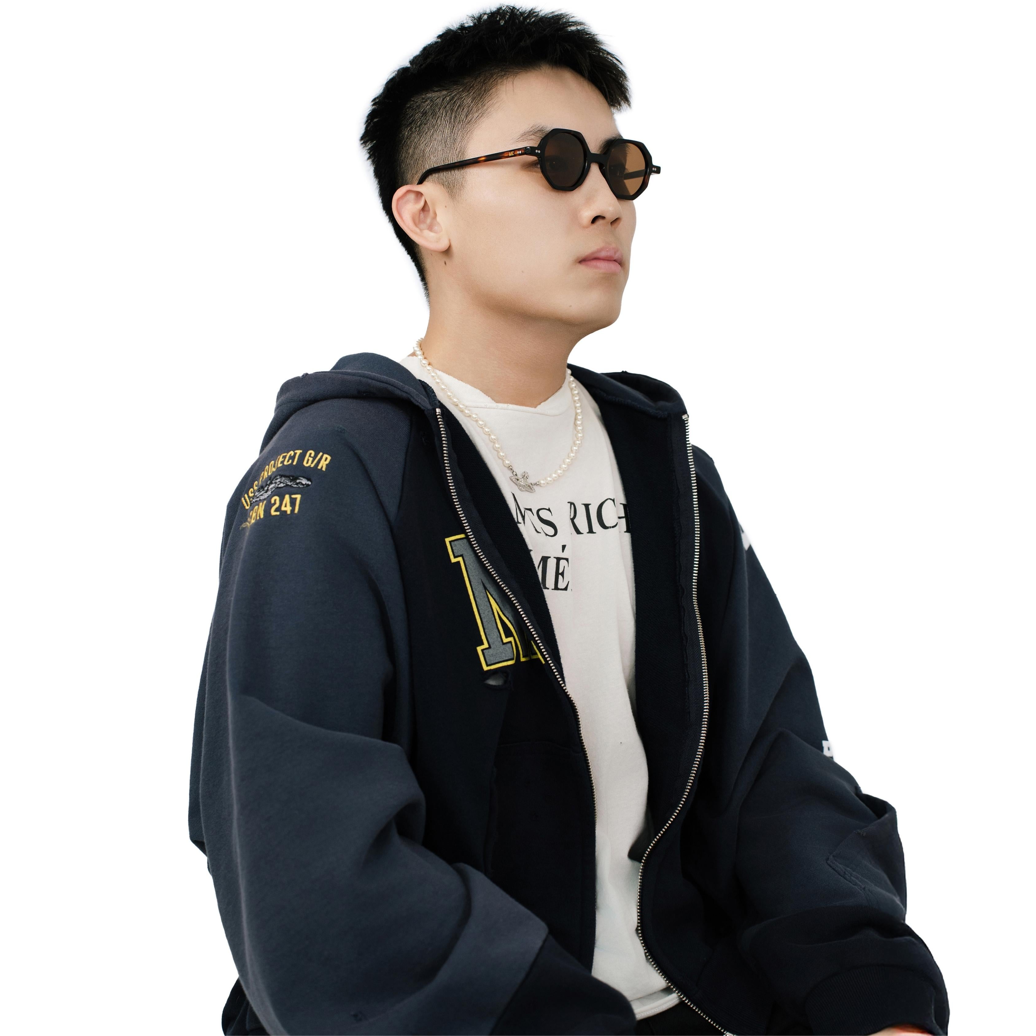 VLIZ Grid sunglasses with tortoise octagon frame and brown lenses, sculptural streetwear design with engraved logo on temples.