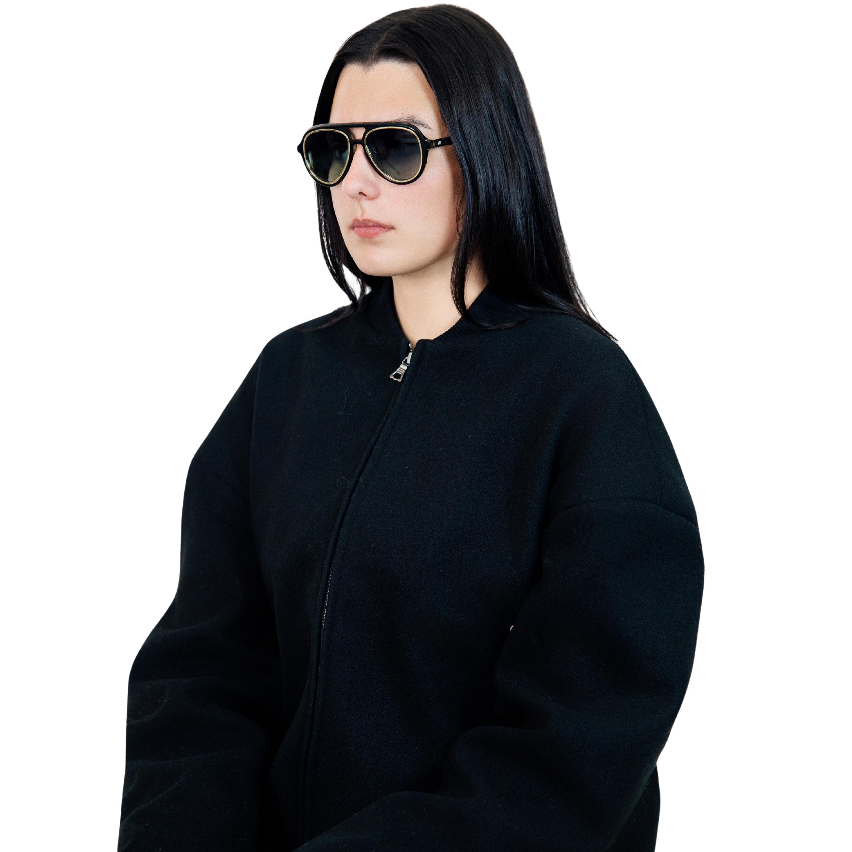 VLIZ Lindbergh sunglasses with black aviator-style frame and gradient blue lenses, retro double-bridge design, engraved logo on temples
