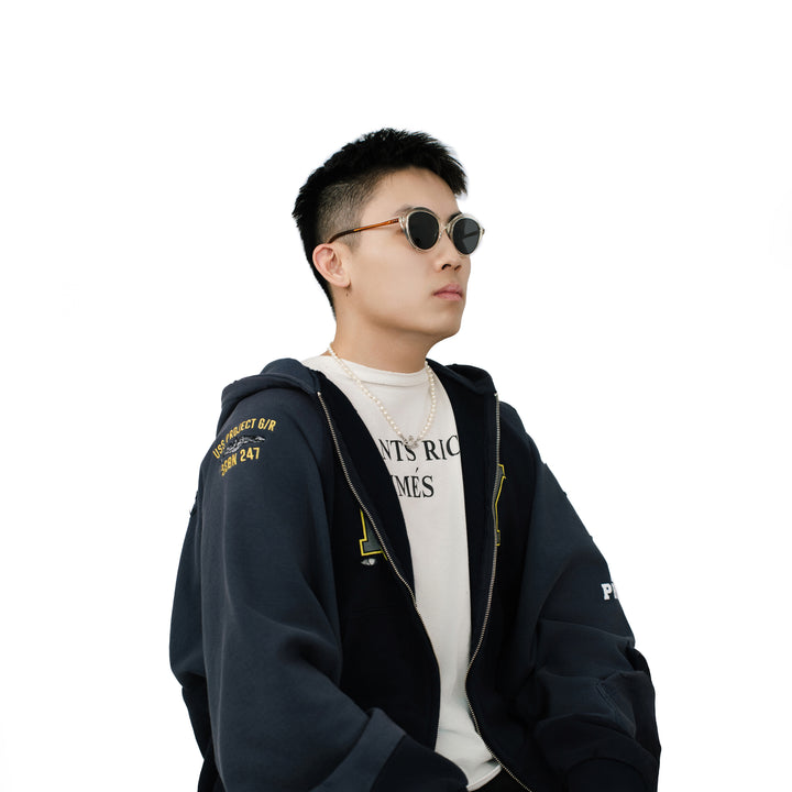 VLIZ Lucent round sunglasses with translucent frame and black lenses, street-style gradient design, engraved logo on temples.
