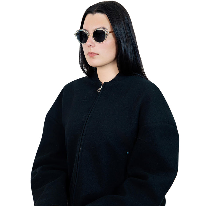 VLIZ Lucent round sunglasses with translucent frame and black lenses, street-style gradient design, engraved logo on temples.
