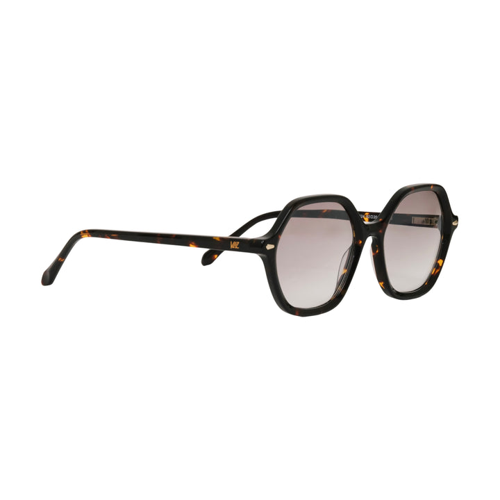 VLIZ Lunelle sunglasses with a tortoise octagon frame and light brown gradient lenses, sculptural silhouette inspired by lunar geometry, engraved logo on temples
VLIZ Lunelle sunglasses with a tortoise octagon frame and gradient lenses, sculptural silhouette inspired by lunar geometry, engraved logo on temples.