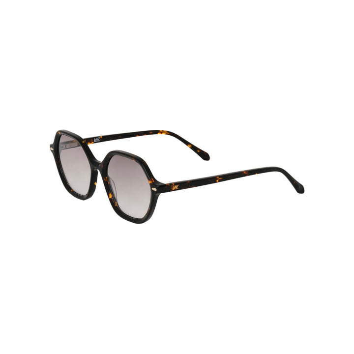 VLIZ Lunelle sunglasses with a tortoise octagon frame and light brown gradient lenses, sculptural silhouette inspired by lunar geometry, engraved logo on temples
VLIZ Lunelle sunglasses with a tortoise octagon frame and gradient lenses, sculptural silhouette inspired by lunar geometry, engraved logo on temples.