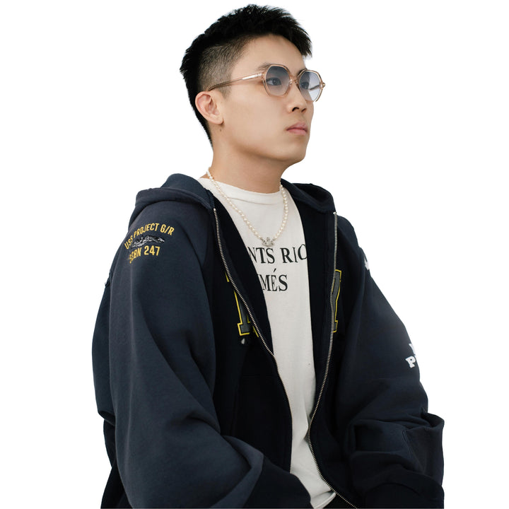 VLIZ Lunelle sunglasses with a translucent tea octagon frame and light blue gradient lenses, sculptural silhouette inspired by lunar geometry, engraved logo on temples