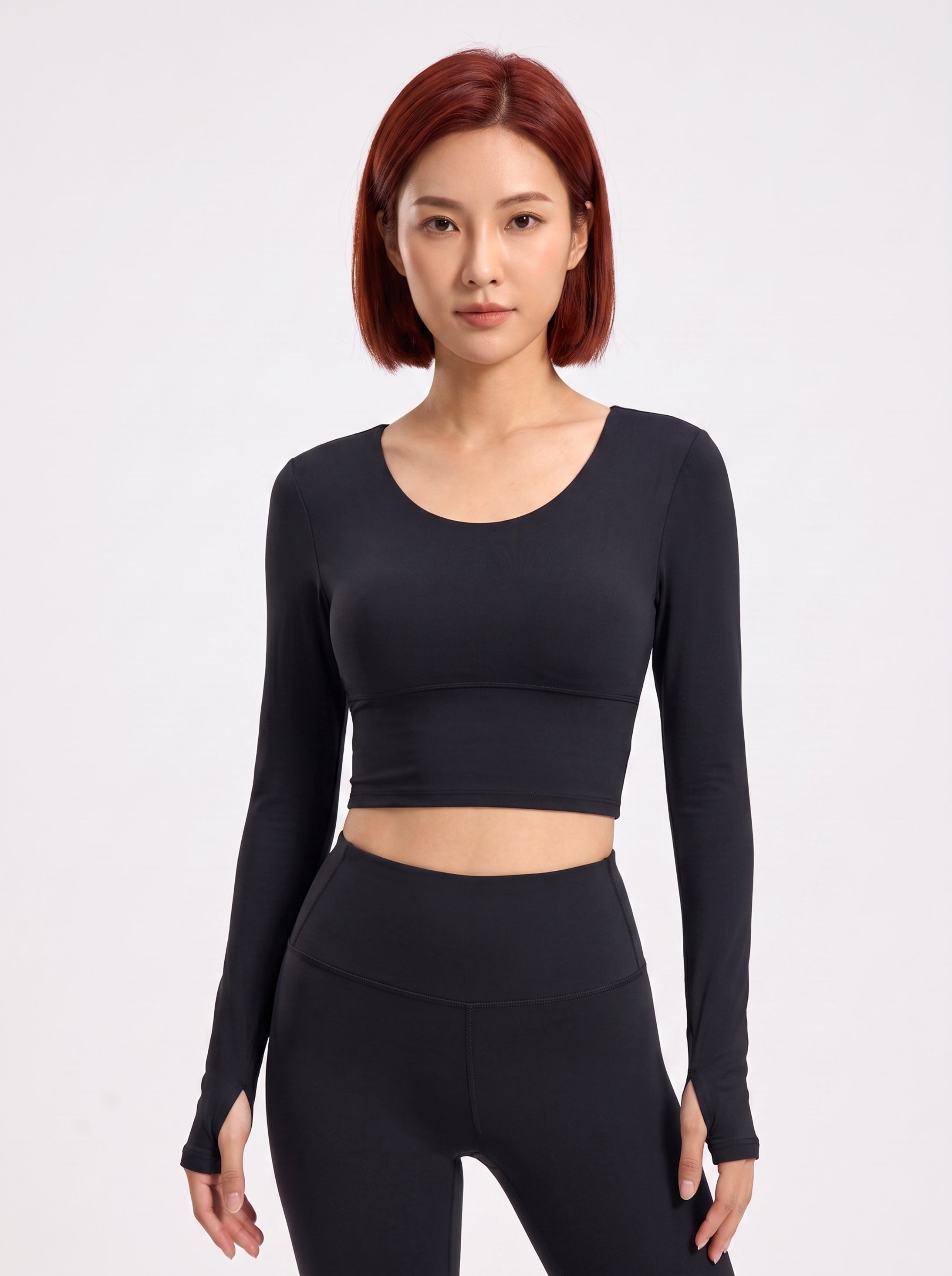 VLIZ black long-sleeve sports bra with cross-back design, front view