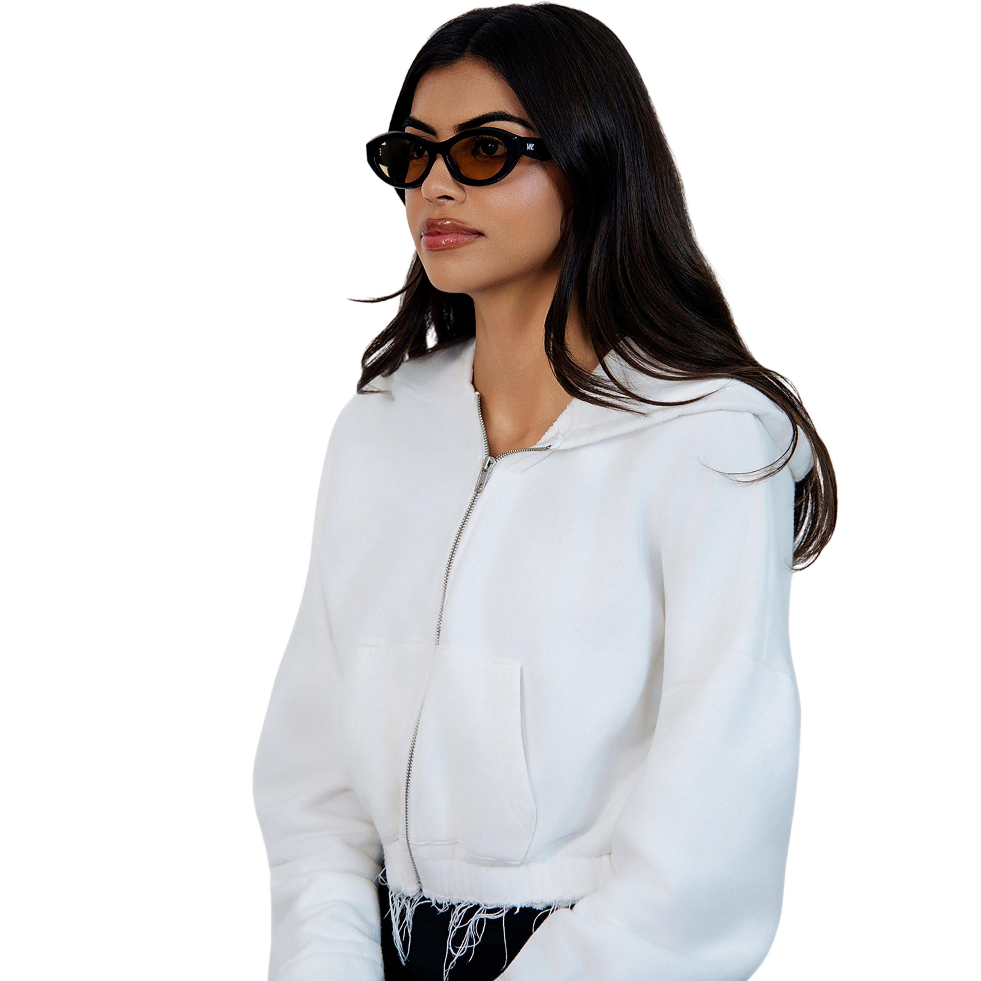 VLIZ Nolita oval sunglasses with black frame and brown lenses, featuring smooth oval design and engraved logo on temples.