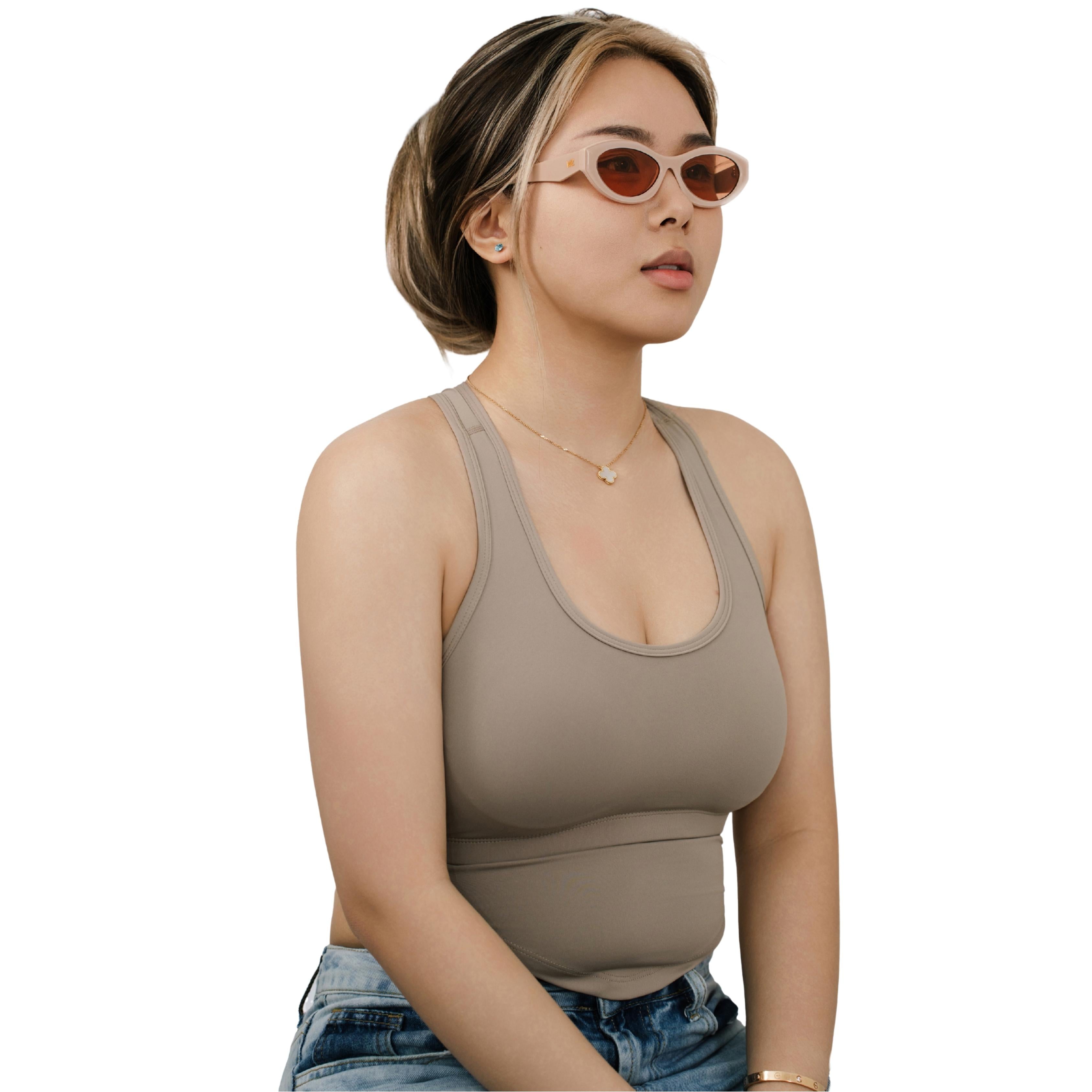 VLIZ Nolita oval sunglasses with pink frame and pink lenses, featuring smooth oval design and engraved logo on temples.